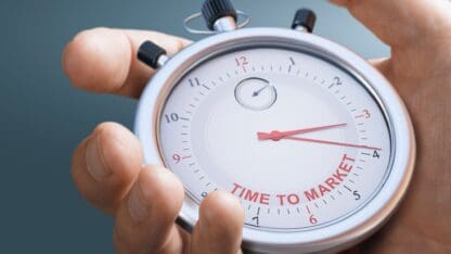 A hand holding a stopwatch.