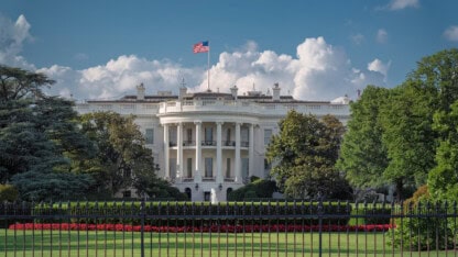 Picture of the white house, representing the president signing an executive order to reschedule cannabis