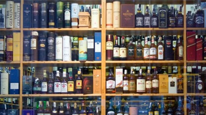 Wall of liquor in restaurant. Businesses with higher alcohol sales face increased exposure.