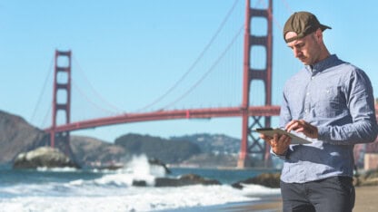 Image of a California consumer in front of the Golden Gate bridge
