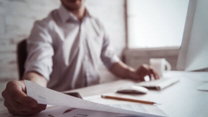 Real estate owner / investor working on monthly accounting