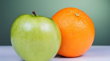 Image of apple and orange representing the comparison between U.S. sales and use tax and global VAT/GST systems