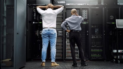 IT workers trying to identify a problem in a Tribal casino server room